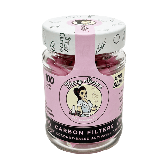 A close-up of Blazy Susan Filter Tips in a colorful package, angled slightly with text and design elements visible.