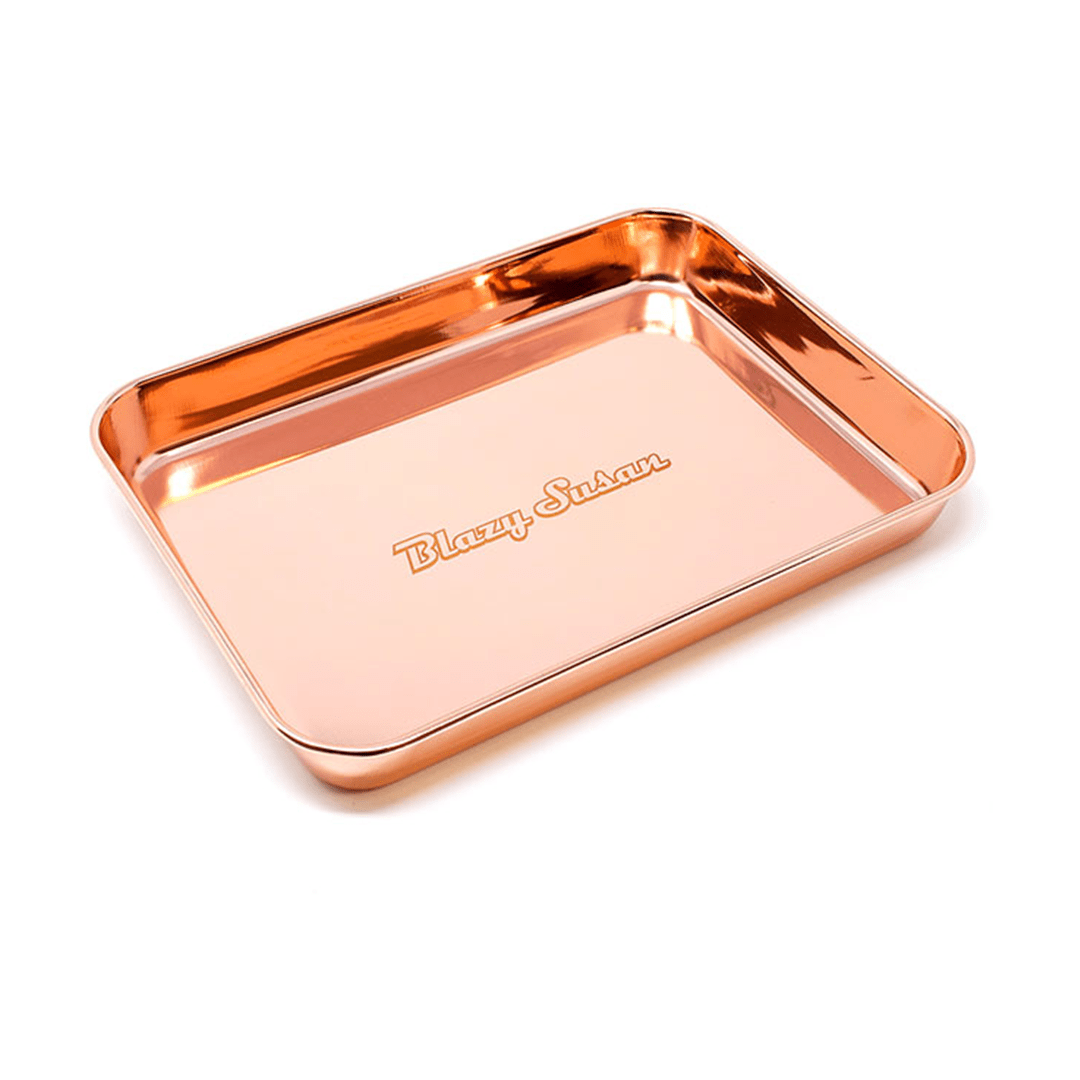 Overhead view of the Blazy Susan Rolling Tray, a sleek, metallic tray reflecting light on a white background.