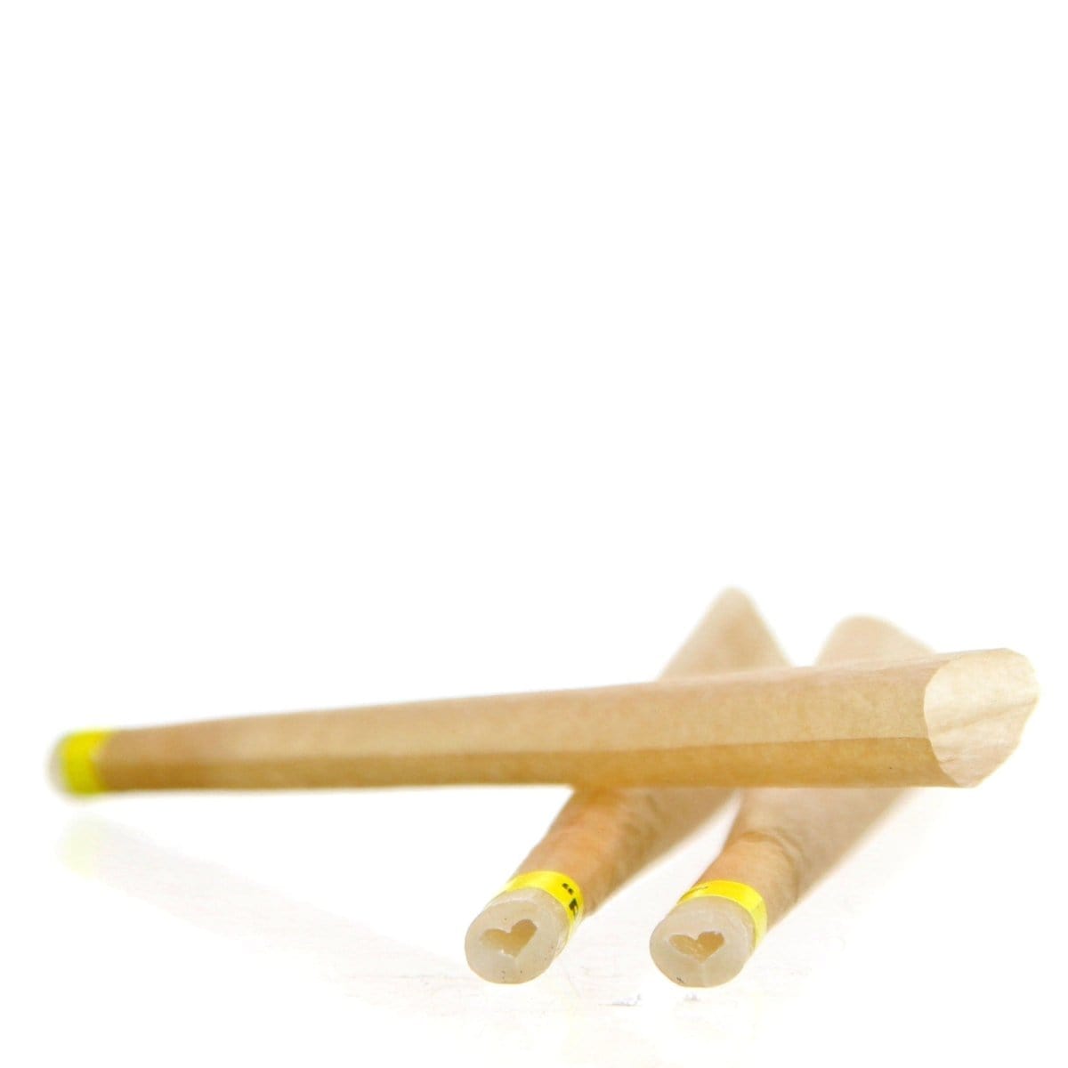 A close-up, angled view of the Bloomers Wildflower Seed Filter Rolling Tips 11 Pack, showing the light brown filters arranged diagonally.