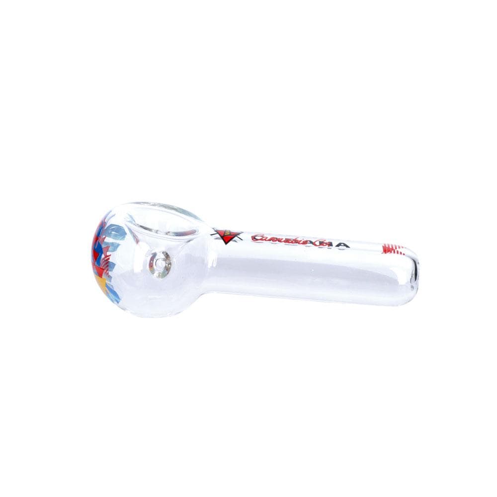 A studio shot of the 5” The Afterglow Spoon Hand Pipe in clear glass, angled to showcase its curved bowl and streamlined shape.