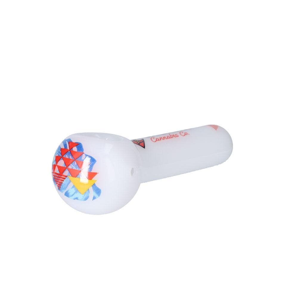 A close-up studio shot of The Afterglow 5” Spoon Hand Pipe, showcasing its colorful and patterned design.
