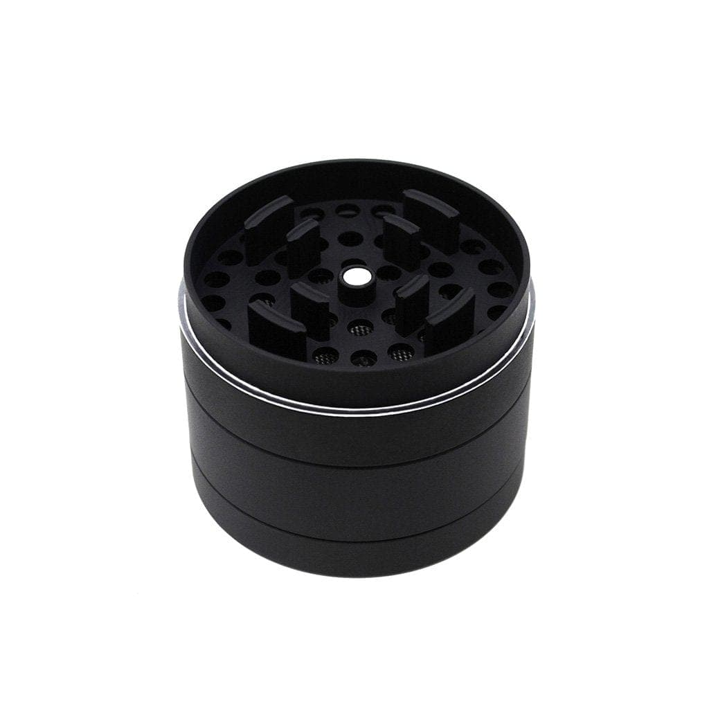 A top-down view of the four-piece Cali Crusher Homegrown Grinder, showing the textured metallic grinding surface.