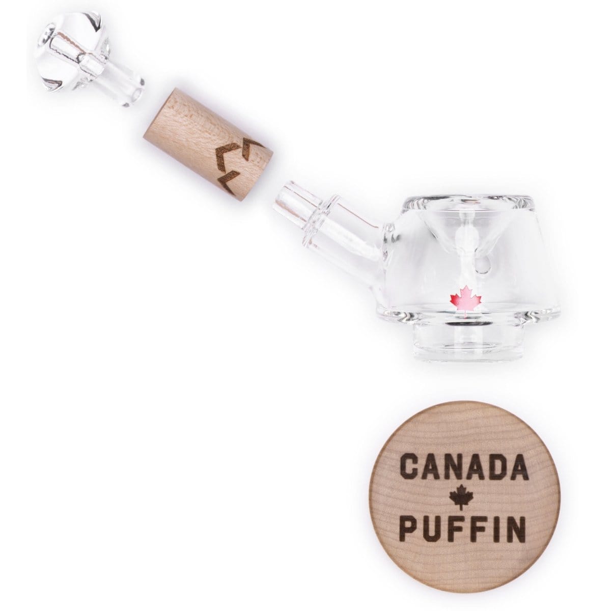 A side view of the Canada Puffin Stone Spoon Pipe, showcasing its clear glass construction and simple, rounded shape.