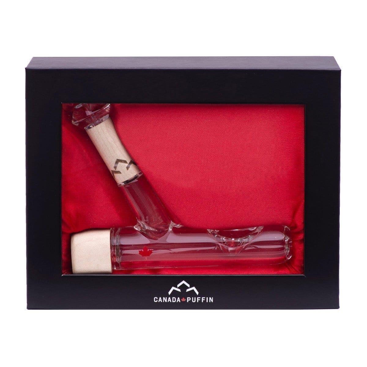 Front view of the Canada Puffin Chalet Steamroller, a clear glass pipe against a black background.