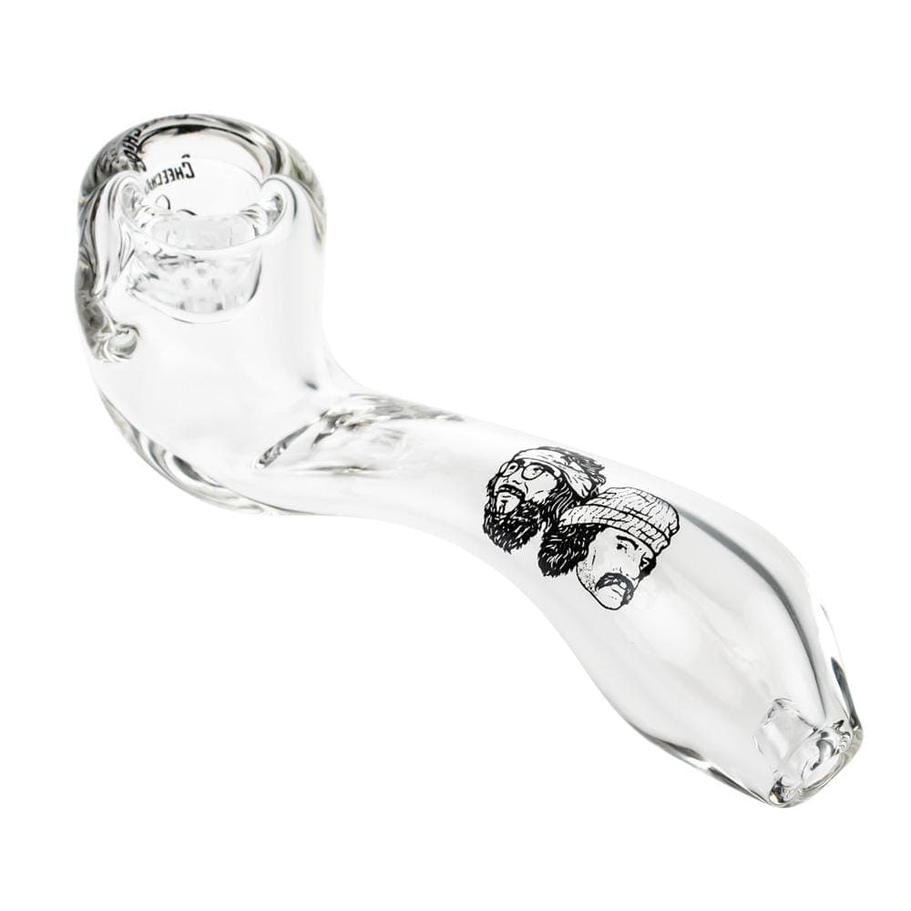 A side view of the CHEECH & CHONG FAMOUS X 4 IN SHERLOCK HAND PIPES, showcasing its clear glass construction and unique curved design.