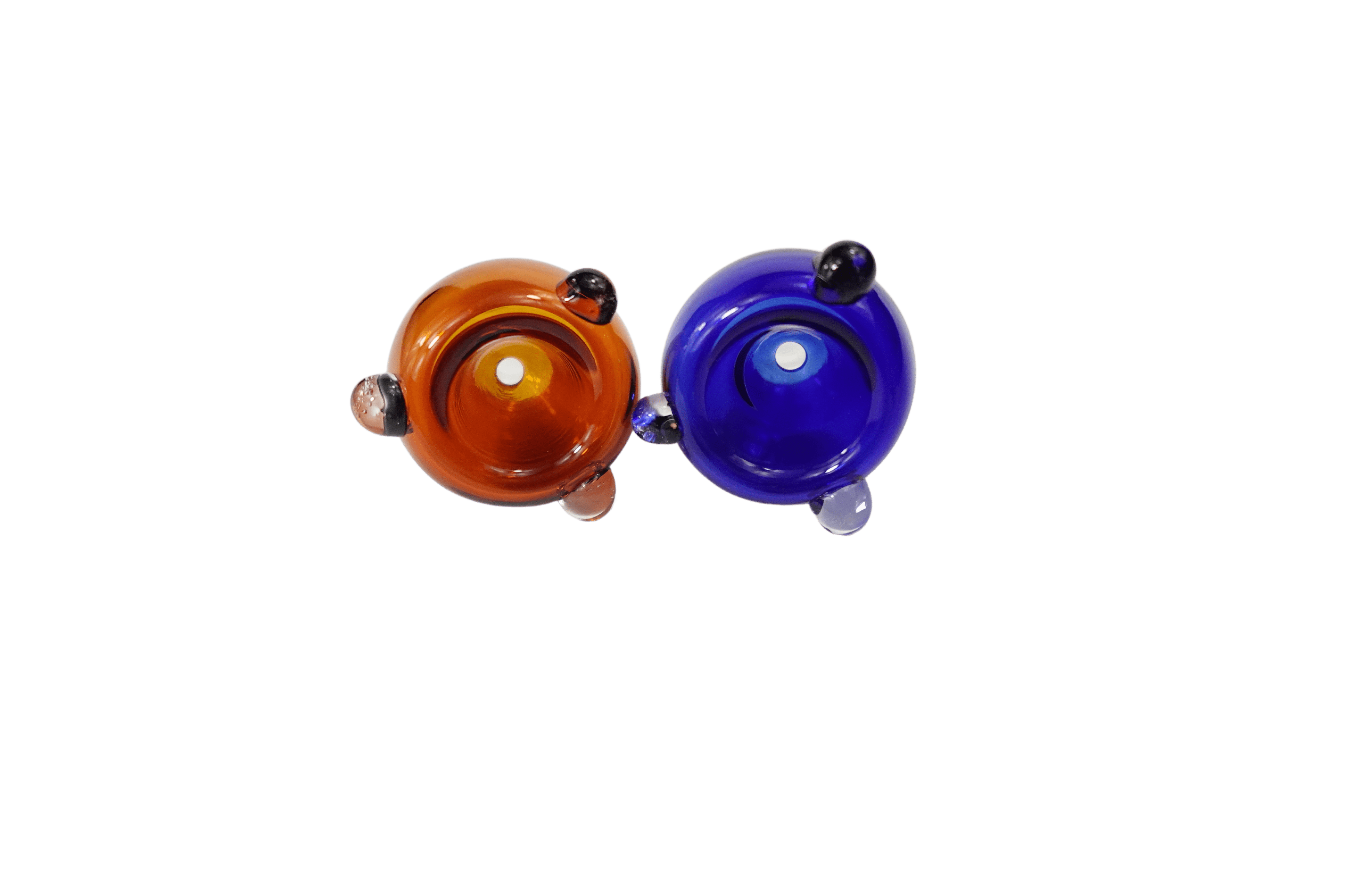 A close-up, angled view of the 14.5 mm Male Glass Herb Bowl Glass Bowl, showcasing its rounded glass form and polished finish.