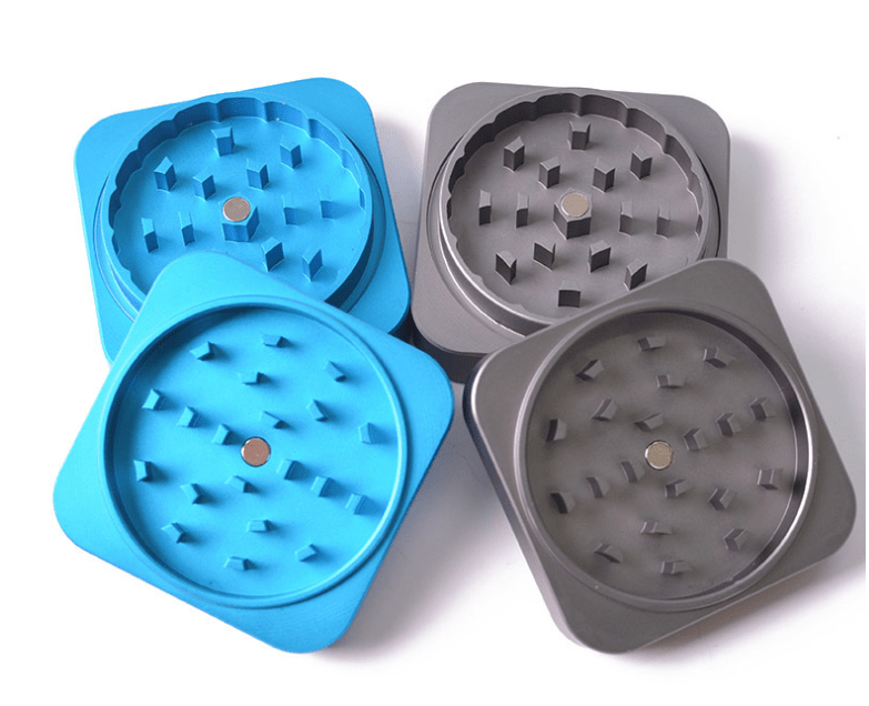 Top-down view of the two-piece Aluminum Square Grinder, showcasing its square shape and metallic finish on a plain white background.