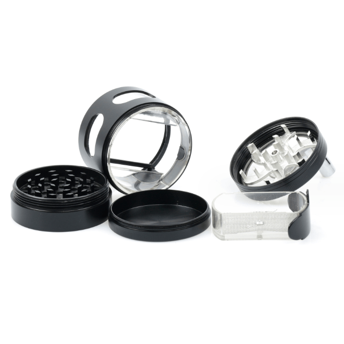 A disassembled view of the 3.5" 4 Piece Hand Crank Grinder with Chamber Window, showcasing its four parts on a white background.