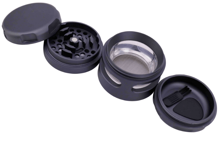 The 3" Aluminum Grip Edge Grinder with Chamber Windows shown in a top-down view, displaying its open chambers and metallic finish.