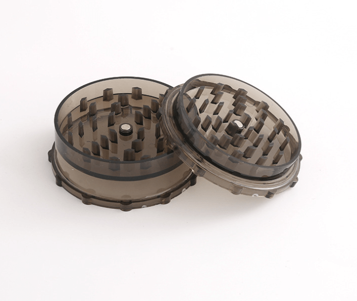 Overhead view of the “3” Large Plastic Grip Edge Grinder, showing its two textured plastic sections slightly apart on a white surface.