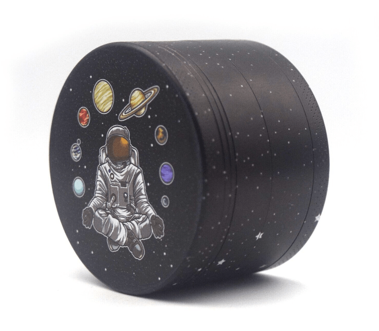 Front view of the 4 Piece 2.5" Trip to the Moon Grinder with a space-themed design against a dark background.