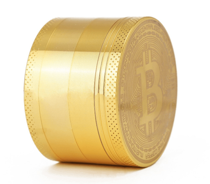 A side view of the 4 Piece Small Bitcoin Metal Grinder, showcasing its metallic finish and circular, layered design.