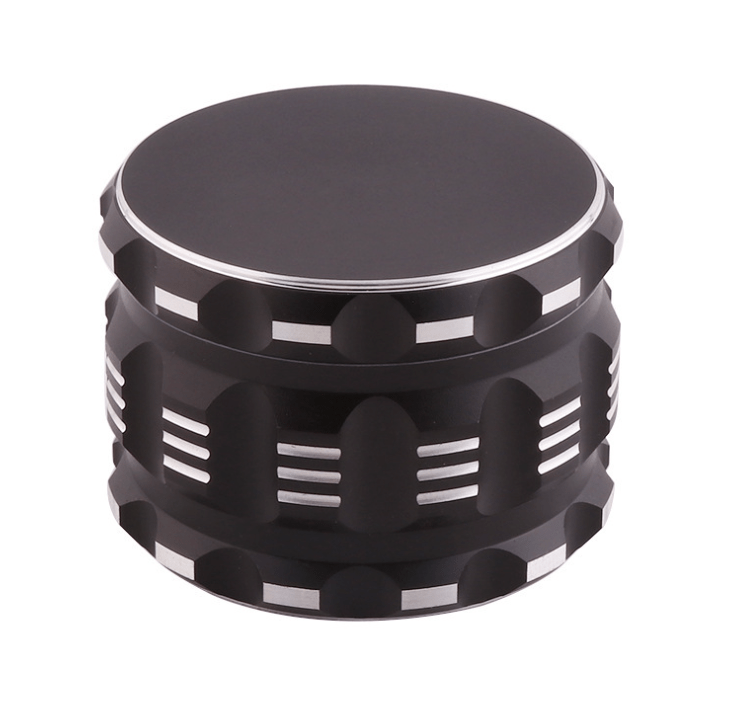 A front view of the 4 Piece Aluminum Drum Shape Grinder, displaying its cylindrical, multi-tiered design with a metallic sheen.