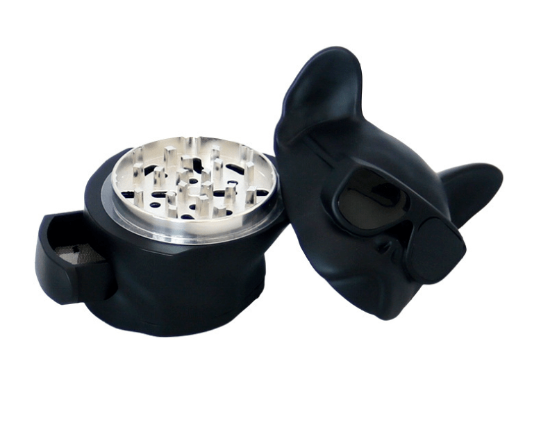 A top-down view of the French Bulldog Grinder, showcasing its sculpted, black design and open grinding chamber.