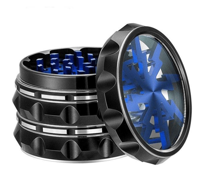 A slightly angled view of the 4 Piece Aluminum Lighting Teeth Grinder, showcasing its open lid and metallic teeth within.