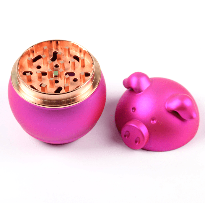 A top-down view of the open Cute Animal Aluminum Grinder, revealing a multi-tiered interior against a clean white background.