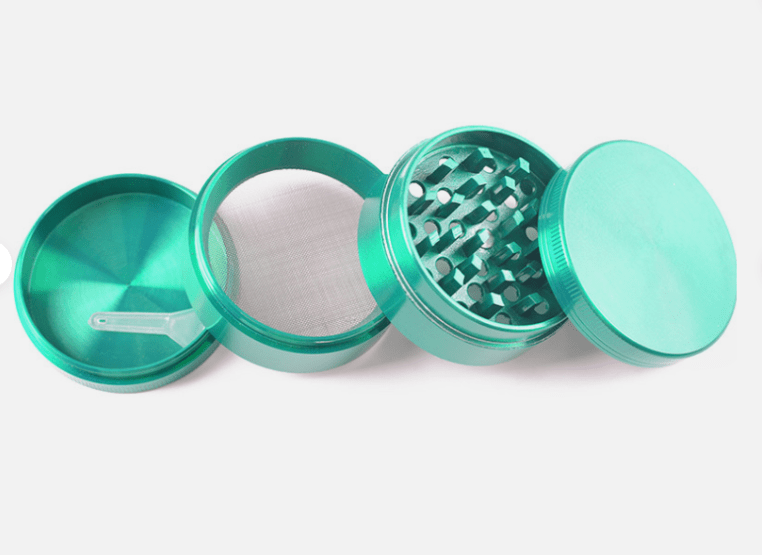 A disassembled 4-Piece Zinc Grinder showing its four metal sections arranged in a row on a plain white background.