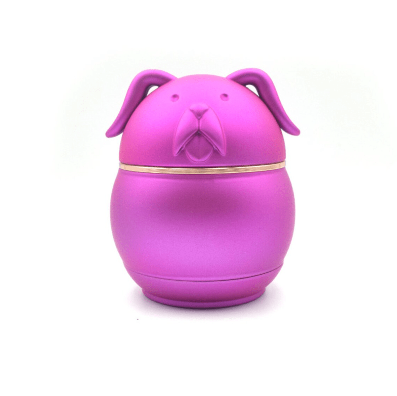 A front view of the Cute Animal Aluminum Grinder, a purple, rounded grinder resembling an animal head.