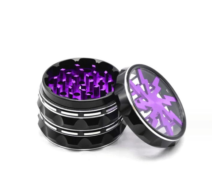 A close-up view of the 4 Piece Aluminum Lighting Teeth Grinder, showcasing its open, multi-tiered design with metallic teeth.