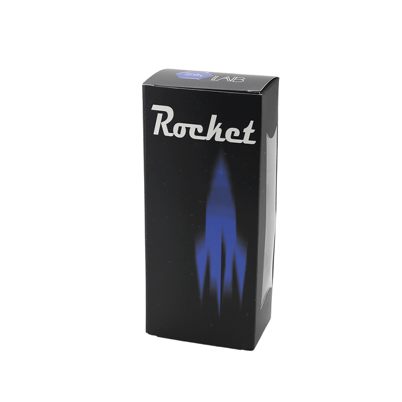 Standing three-quarter view of the Silicone and Glass Rocket Ship Mini Bong box with a black background and blue rocket flame graphic under the "Rocket" logo