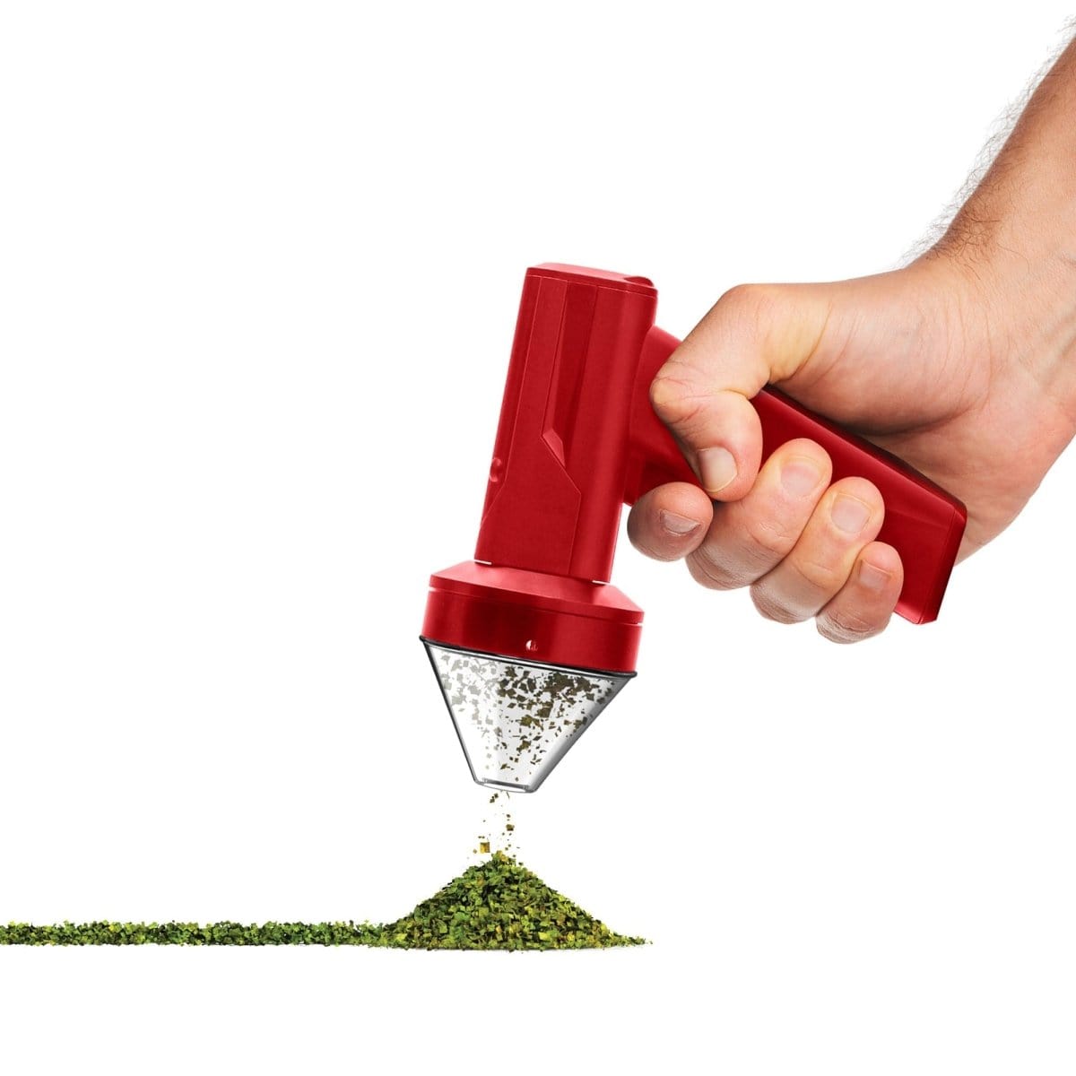 A hand holds the red Cloudious9 The Auto9 - Fully Automatic Grinder, dispensing ground material onto a surface.