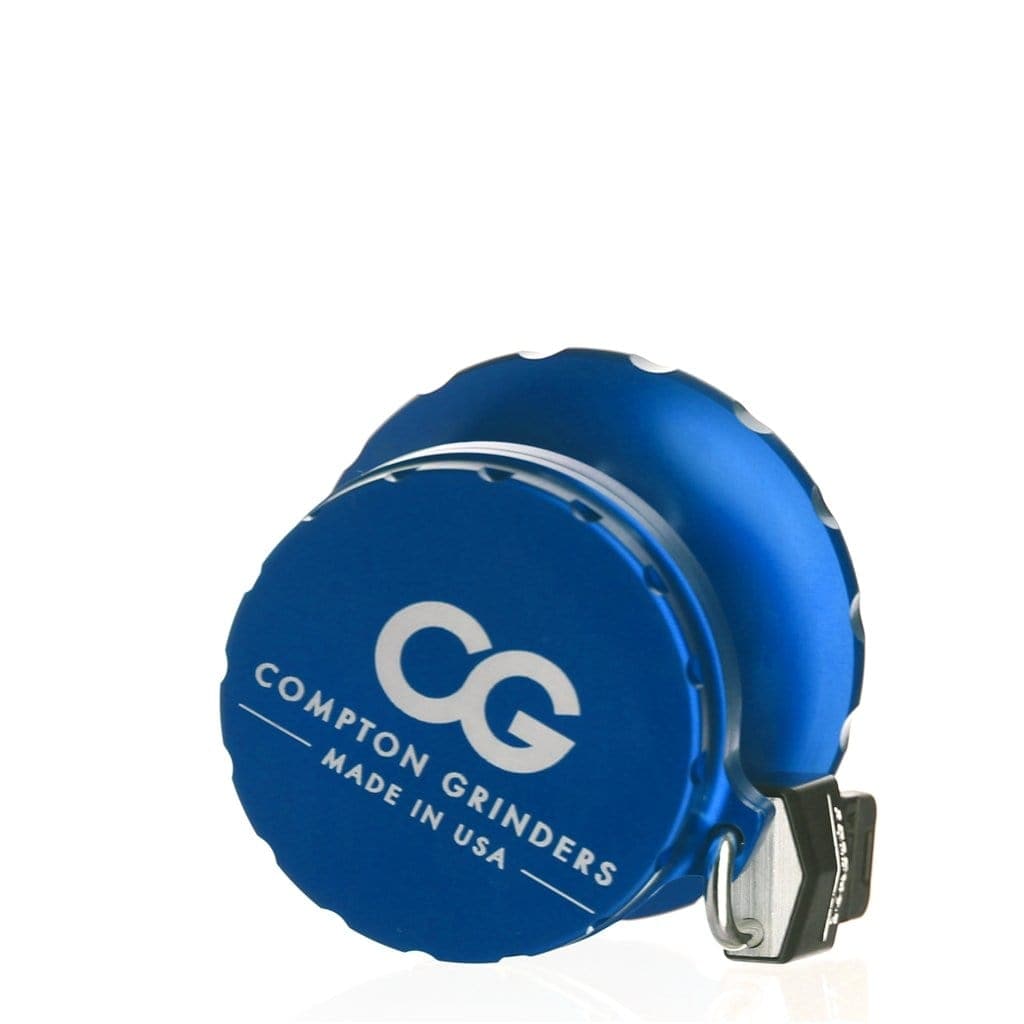 Front view of the Compton Vault, a metal storage container with a dark finish and rounded corners.