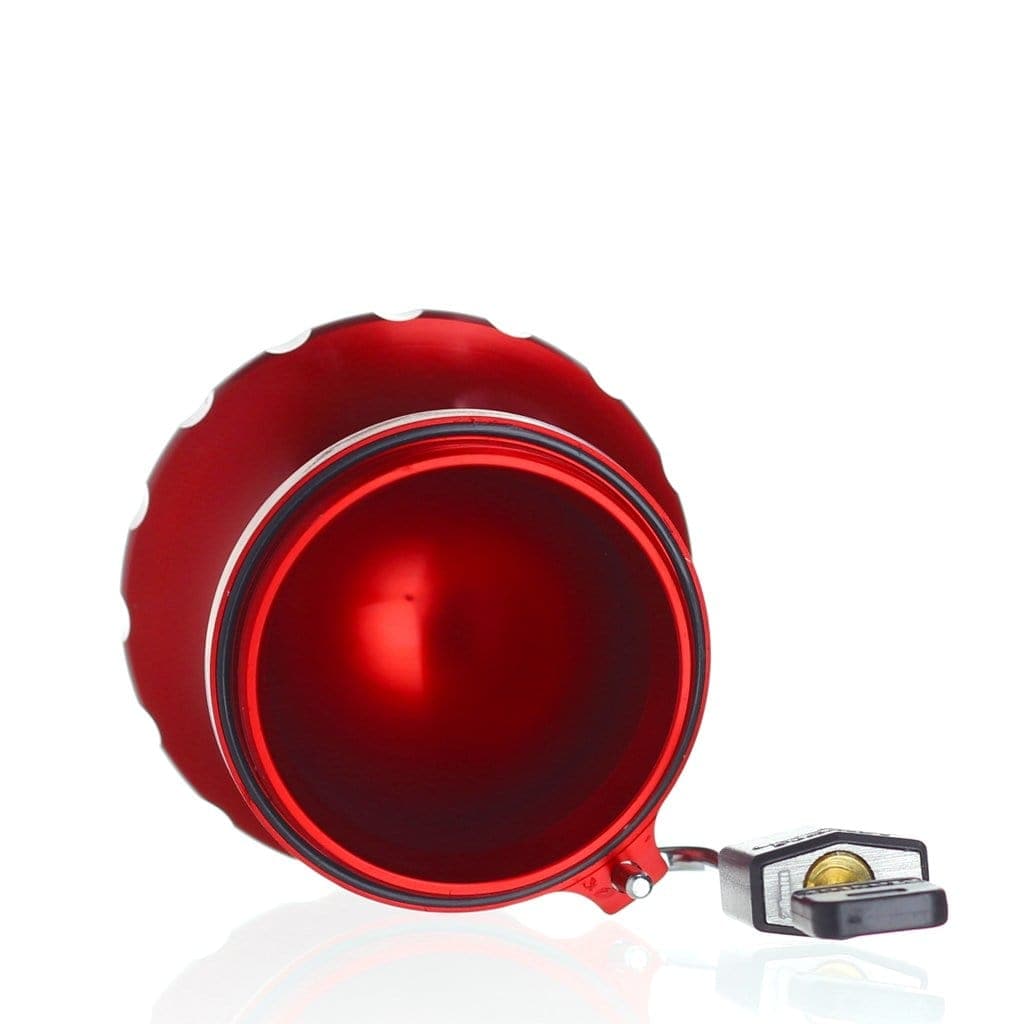 A top-down view of the Compton Vault, showcasing its open top and smooth interior against a white reflective surface.