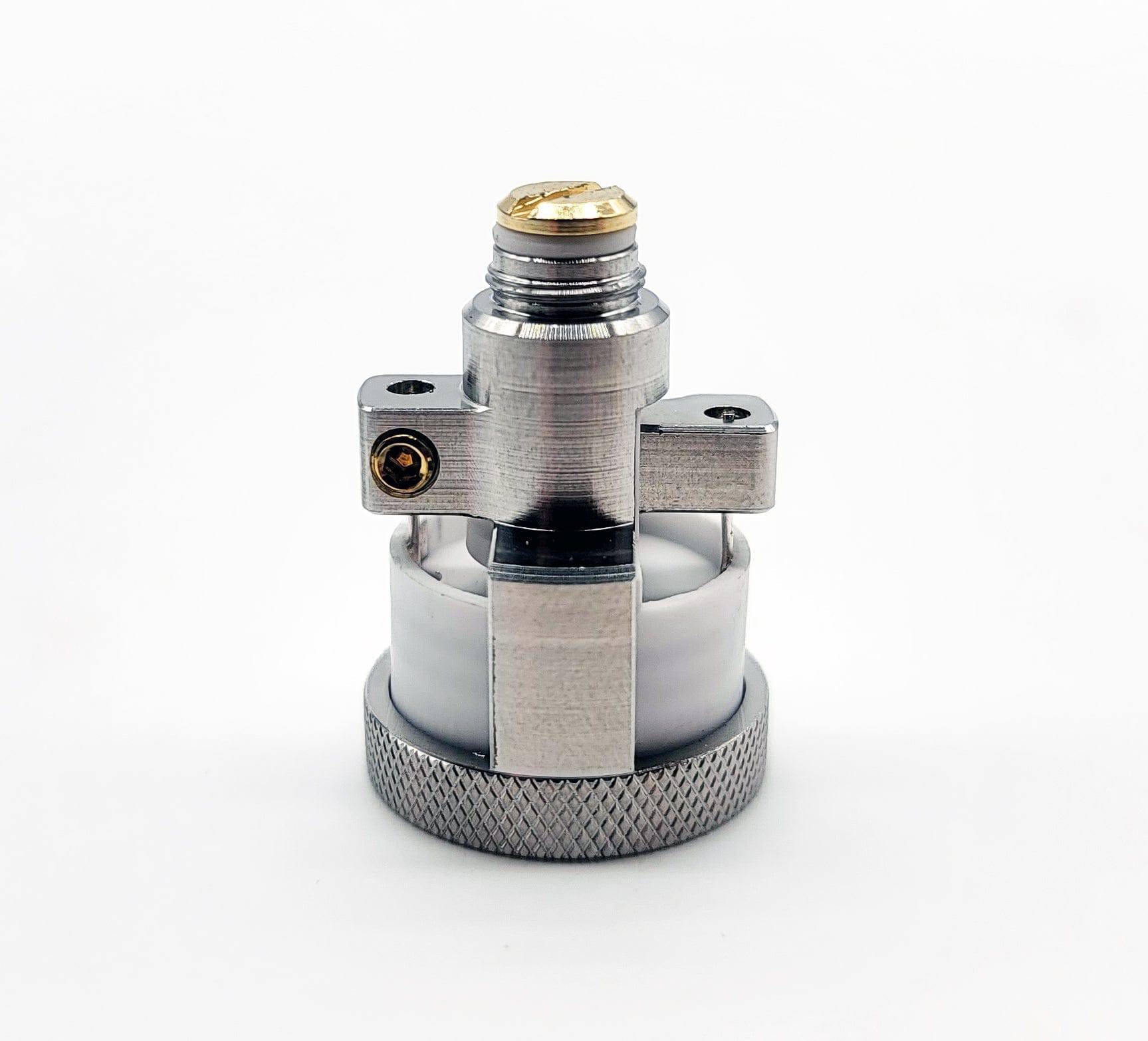 A close-up, angled view of the Dabtech Duvo Rebuildable 3D Atomizer with metallic threading and a textured base.