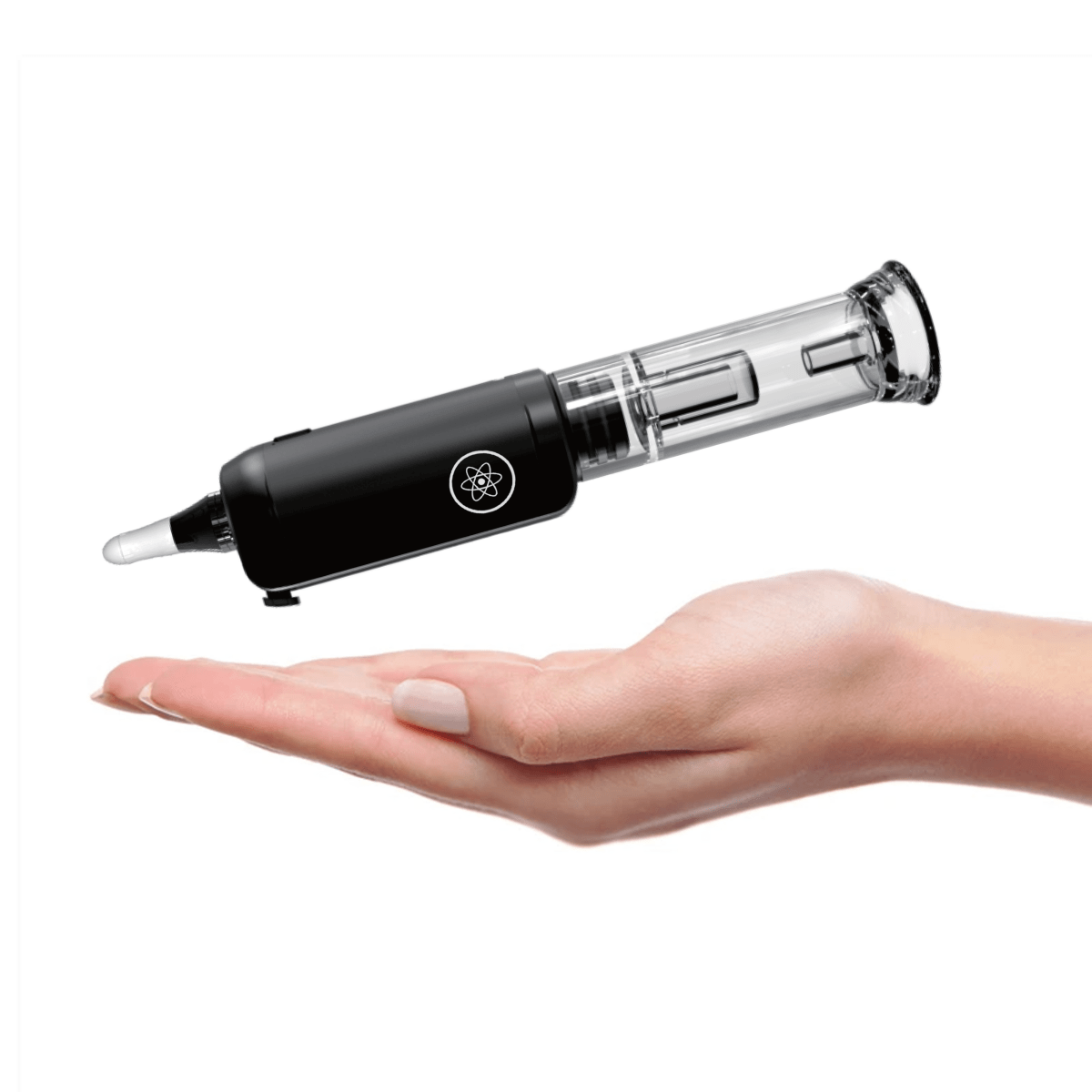 A hand holds the DabTech Trio, showcasing its sleek, black design against a plain white background.