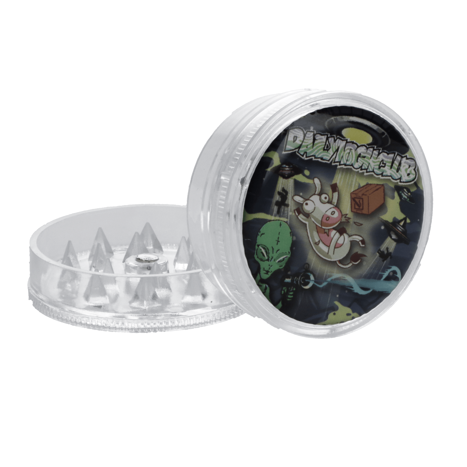 A top-down view of the 2 Piece Abduction Themed Grinder, showing a clear, two-part design with etched teeth on the inner surface.