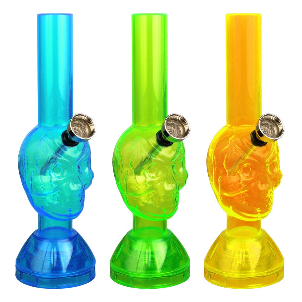 Front view of the 7-inch Mini Acrylic Skull Water Pipe, featuring a skull-shaped design and a built-in grinder base.
