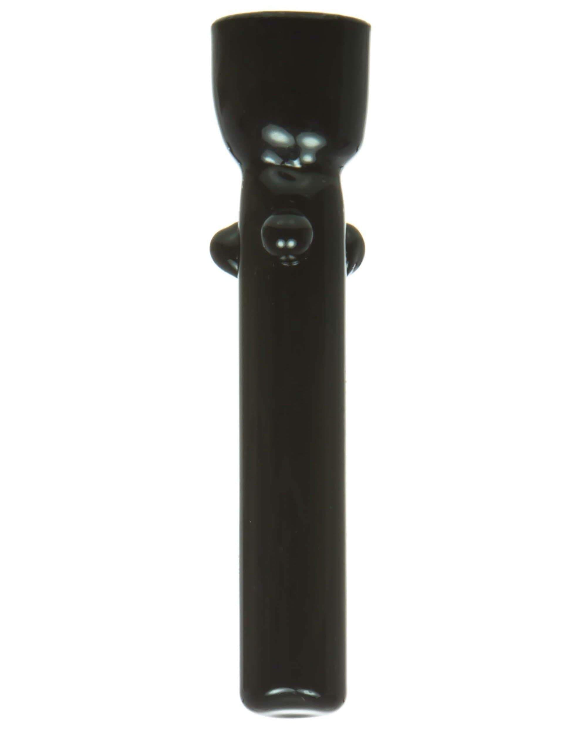 A close-up, angled view of the Glass Nail, highlighting its dark glass construction and simple cylindrical shape.