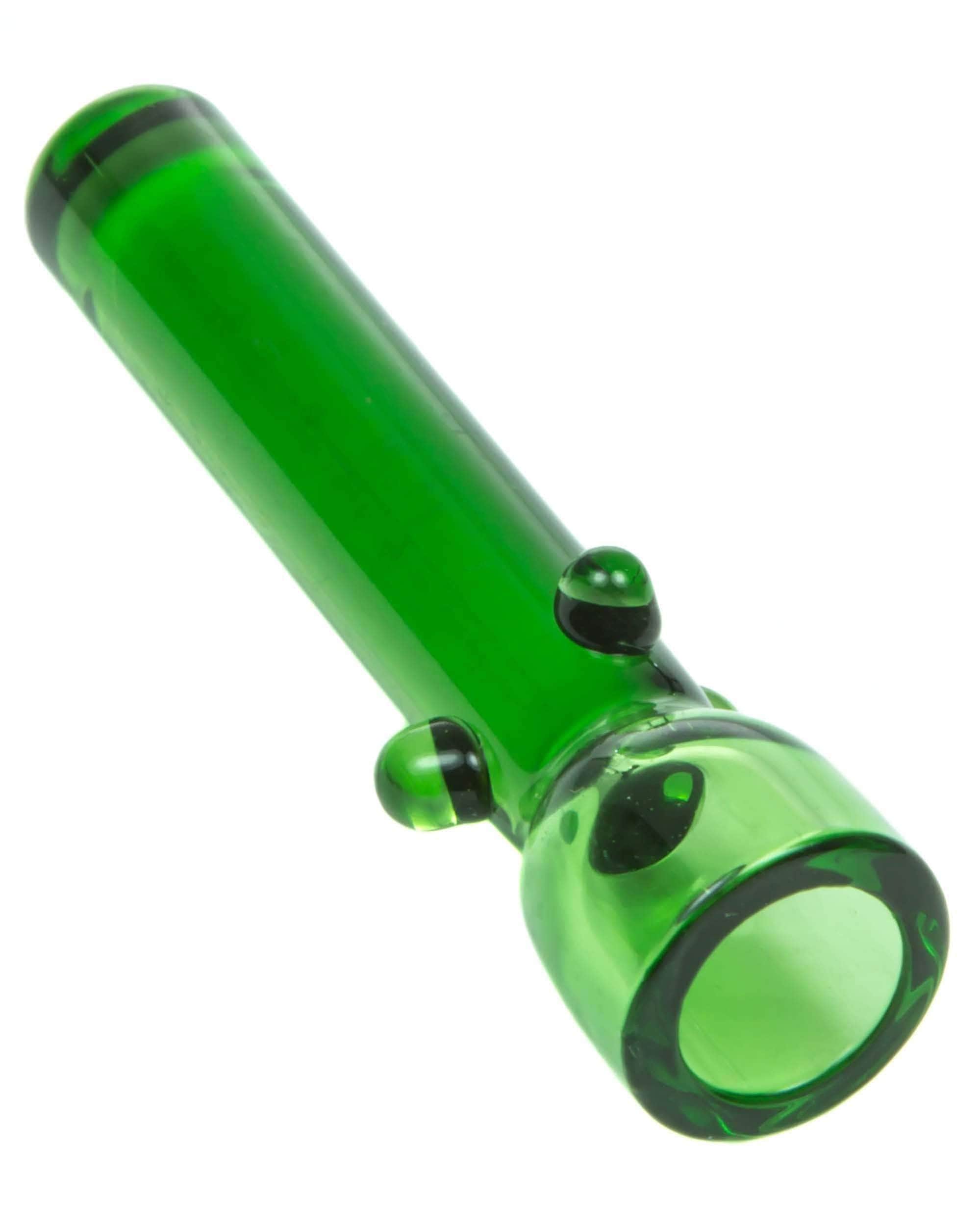 A close-up, angled view of the Glass Nail, showcasing its clear glass construction and simple cylindrical shape.