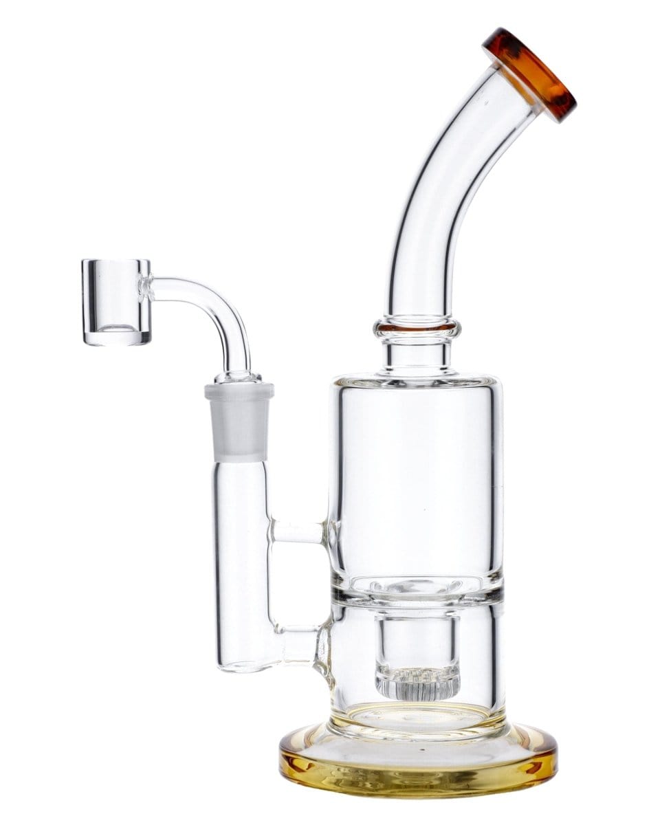 Front view of the Amber Inset Honeycomb Perc Mini Rig, showing its clear glass construction and compact size with a visible honeycomb perc.