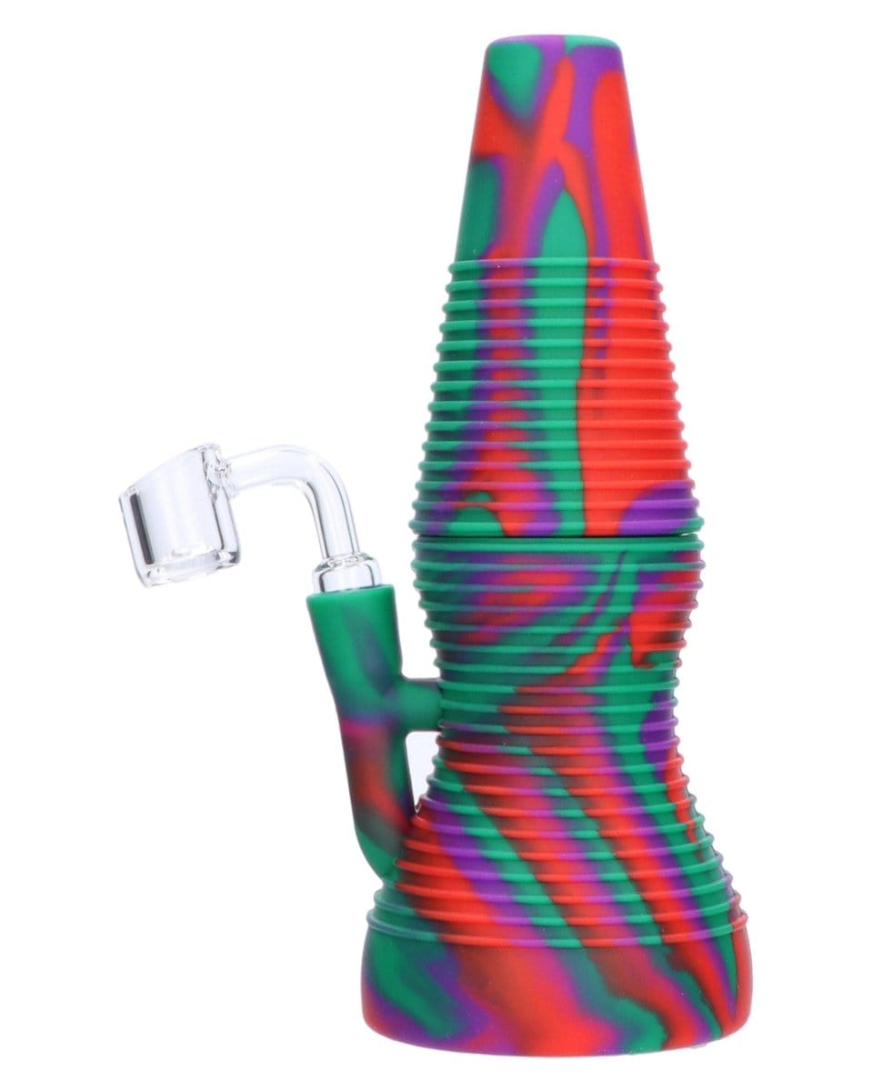 Front view of the Rigid Red Silicone Mini Dab Rig, showing the red and green patterned silicone with a clear glass joint.