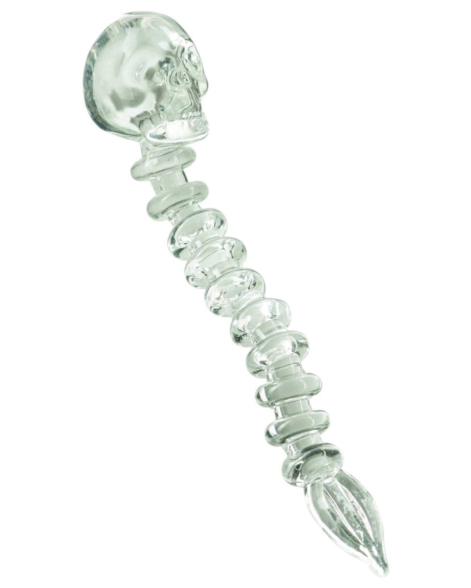A close-up studio shot of the Fatality Dabber, showcasing its slender, clear glass construction and pointed tip.