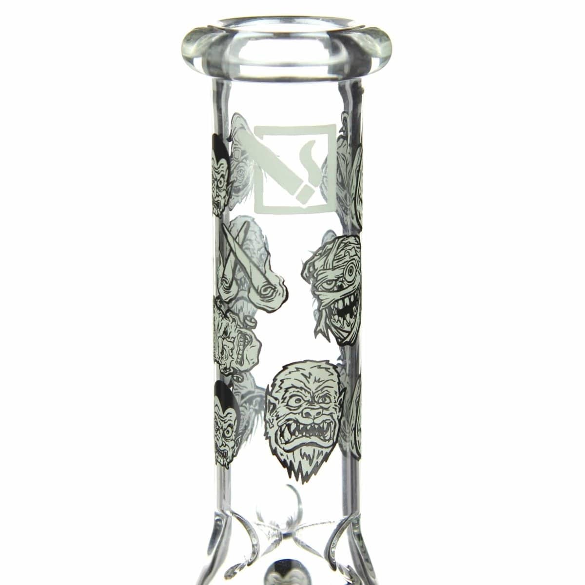 Front view of the DHC Originals "Monster Mash Beaker" dab rig, showcasing etched monster faces on clear glass.