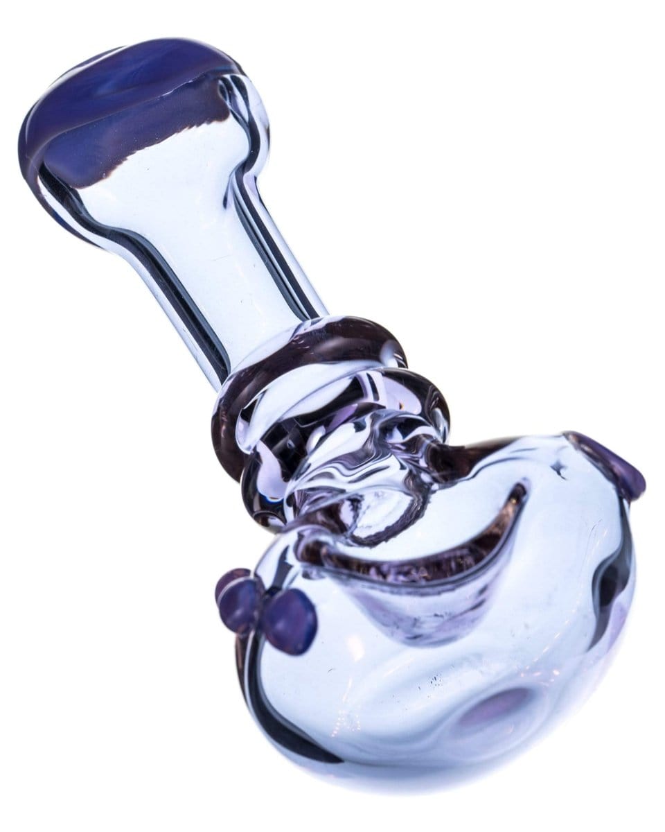 A three-quarter view of the Maria Ring Spoon Pipe, showcasing its curved bowl and smooth glass construction.