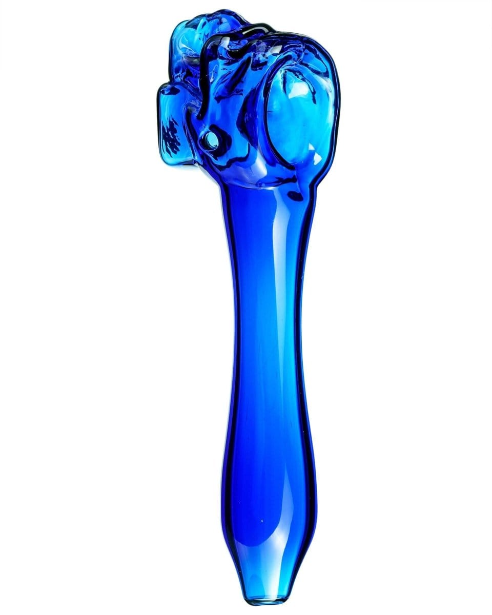 A side view of the Skull Mini Spoon Pipe, showcasing its sculpted design in blue glass.