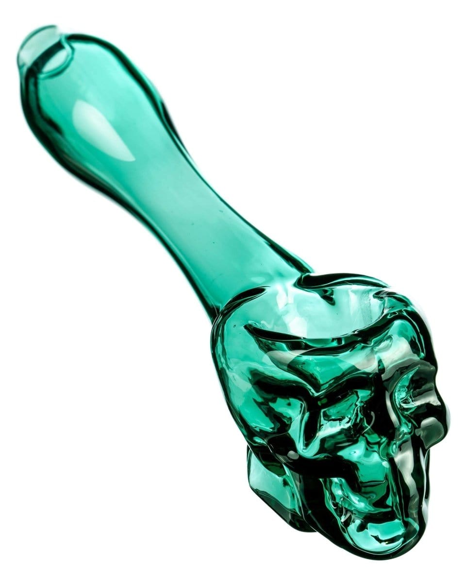 A slightly angled close-up of the Skull Mini Spoon Pipe, showcasing its sculpted design in a vibrant green hue.