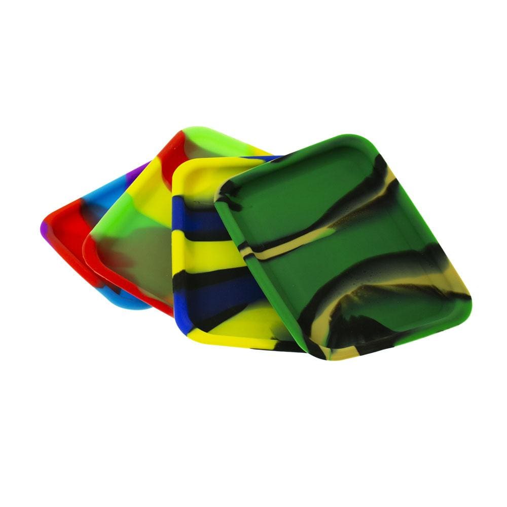 An overhead view of the 8" x 6" Silicone Tray, displaying a stack of colorful, flexible trays.