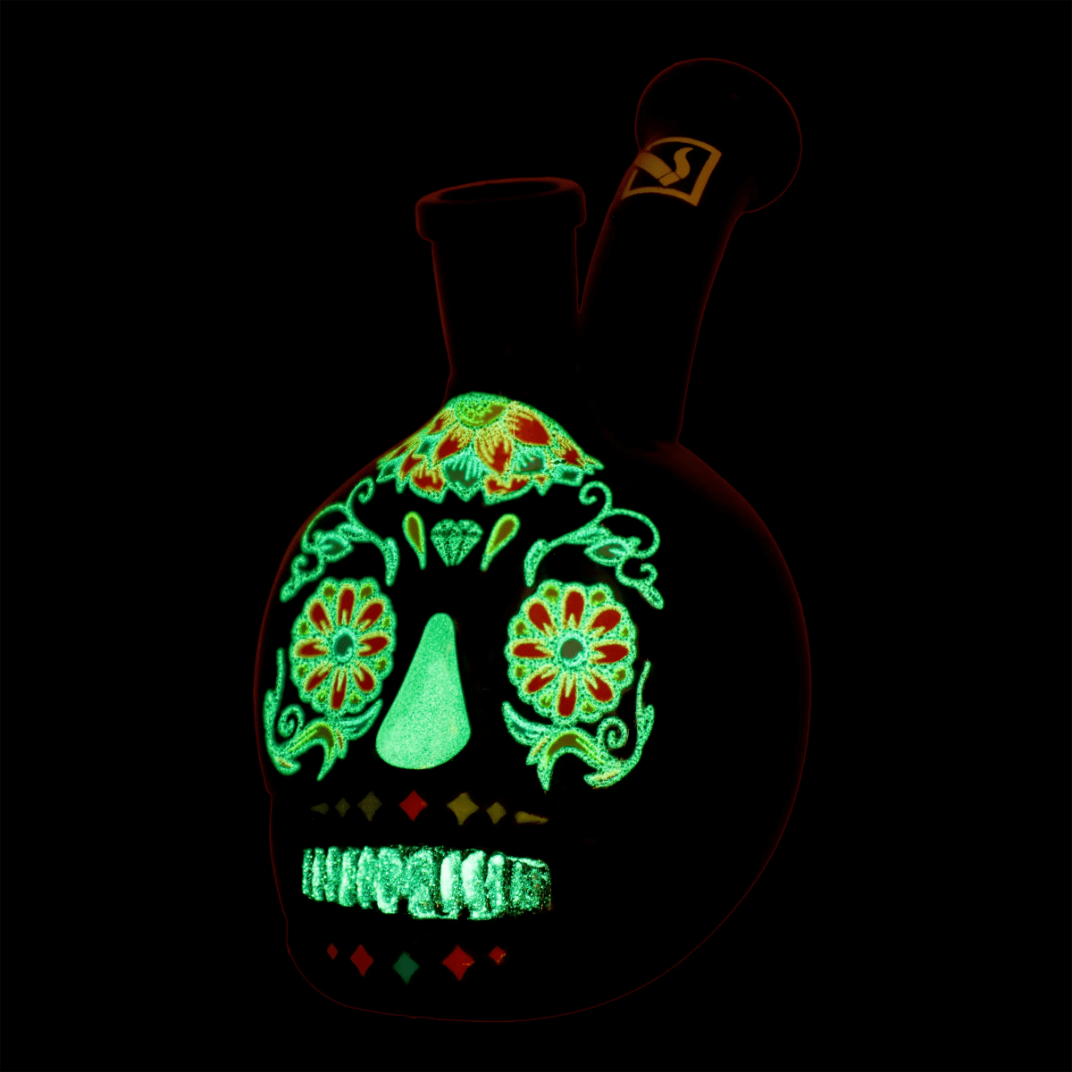 A front view of the “Dia de los Muertos” Box, decorated with colorful skull and floral patterns on a black background.