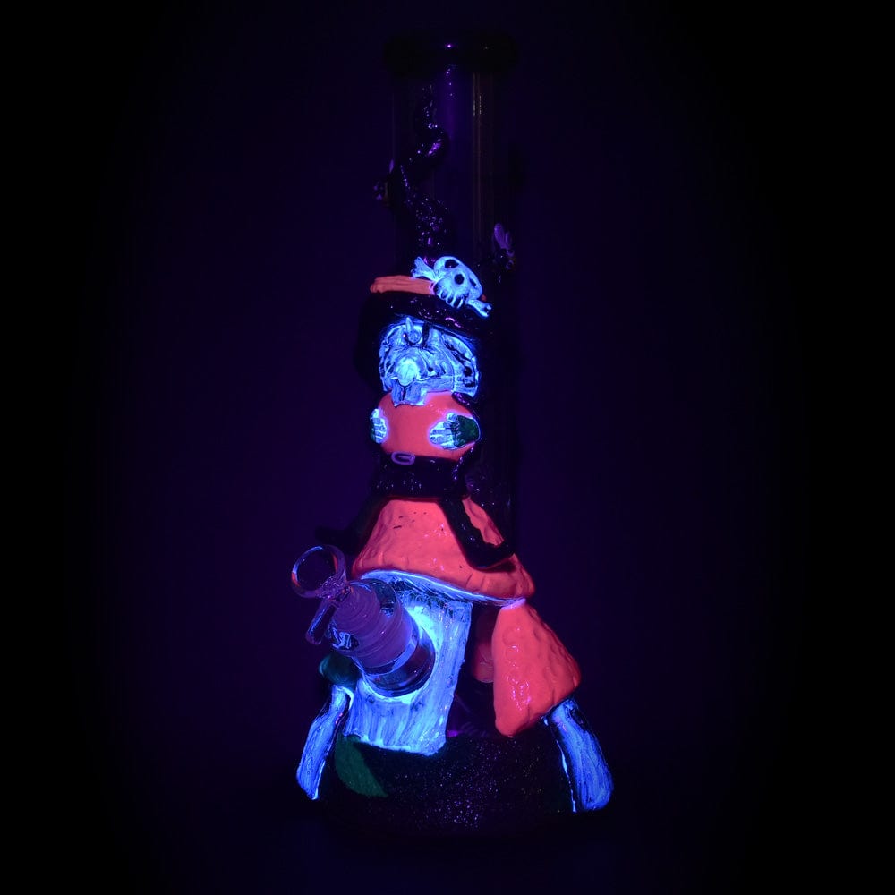 A dramatic, low-angle view of the Witch Way 3D Painted Beaker Water Pipe, featuring vibrant colors and detailed artistry.