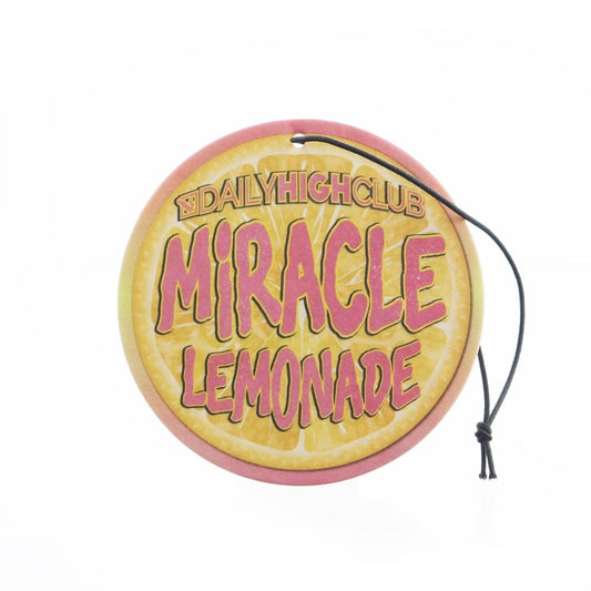 Front view of the August Lemon Air Freshener, a circular yellow tag hanging with a black cord.