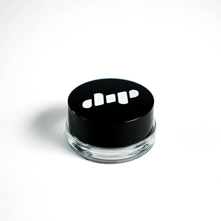 Close-up, top-down view of the Dip Devices Glass Jar, showcasing its clear glass construction and simple cylindrical shape.