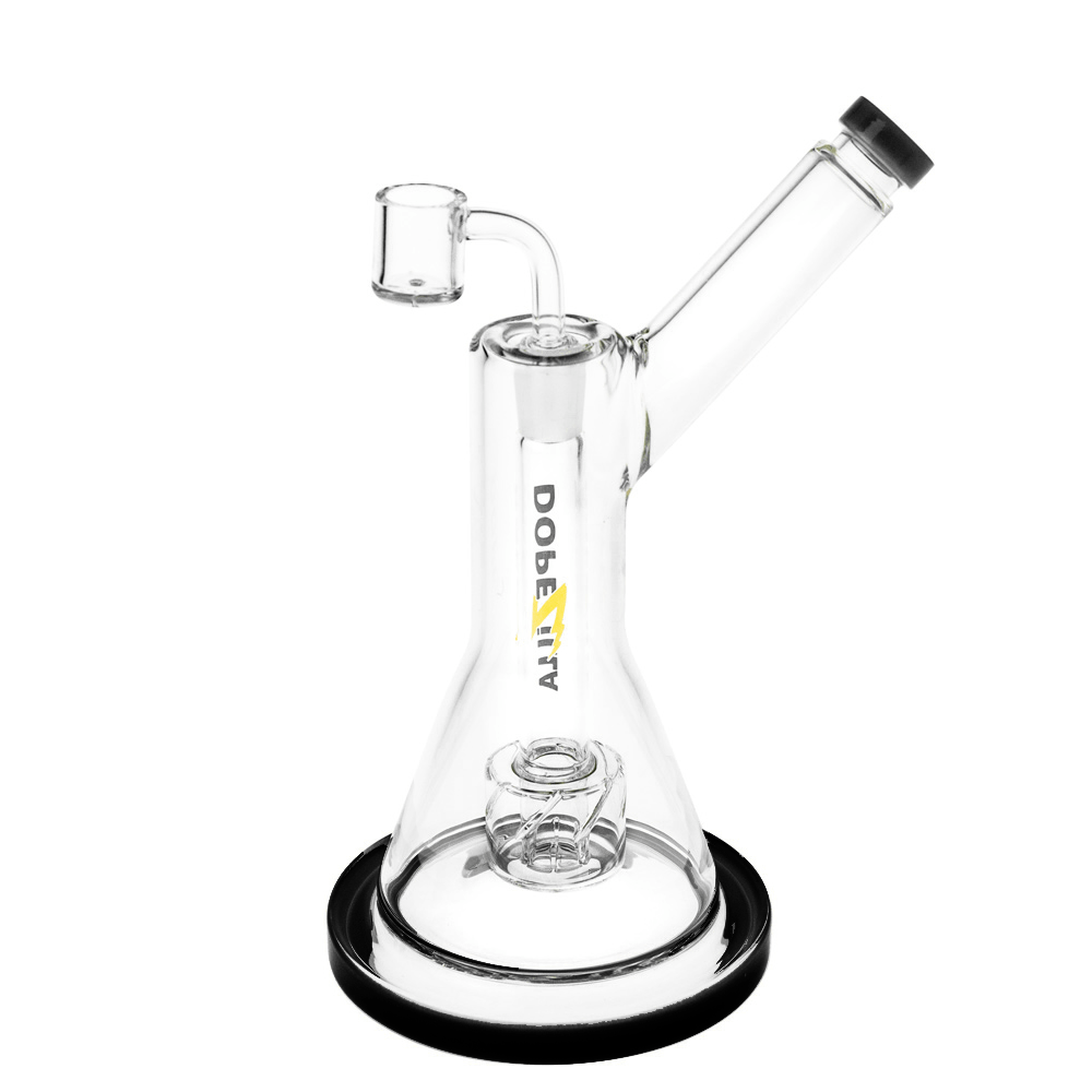 A studio shot of the Dopezilla Dab Rig Basilisk, showcasing its clear glass construction and rounded base from a low angle.