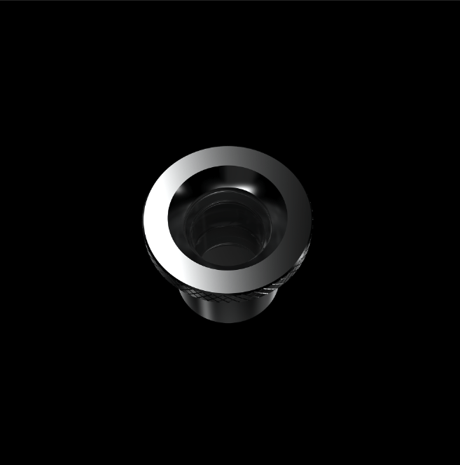 Close-up view of the Boost Evoâ„¢ Quartz Atomizer, showing a dark, circular opening with a smooth, reflective surface.