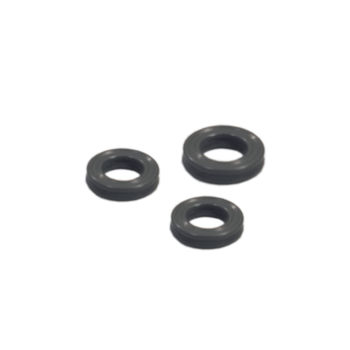 Close-up of the Condenser O-Ring Kit, showing several black rubber rings arranged on a white surface.