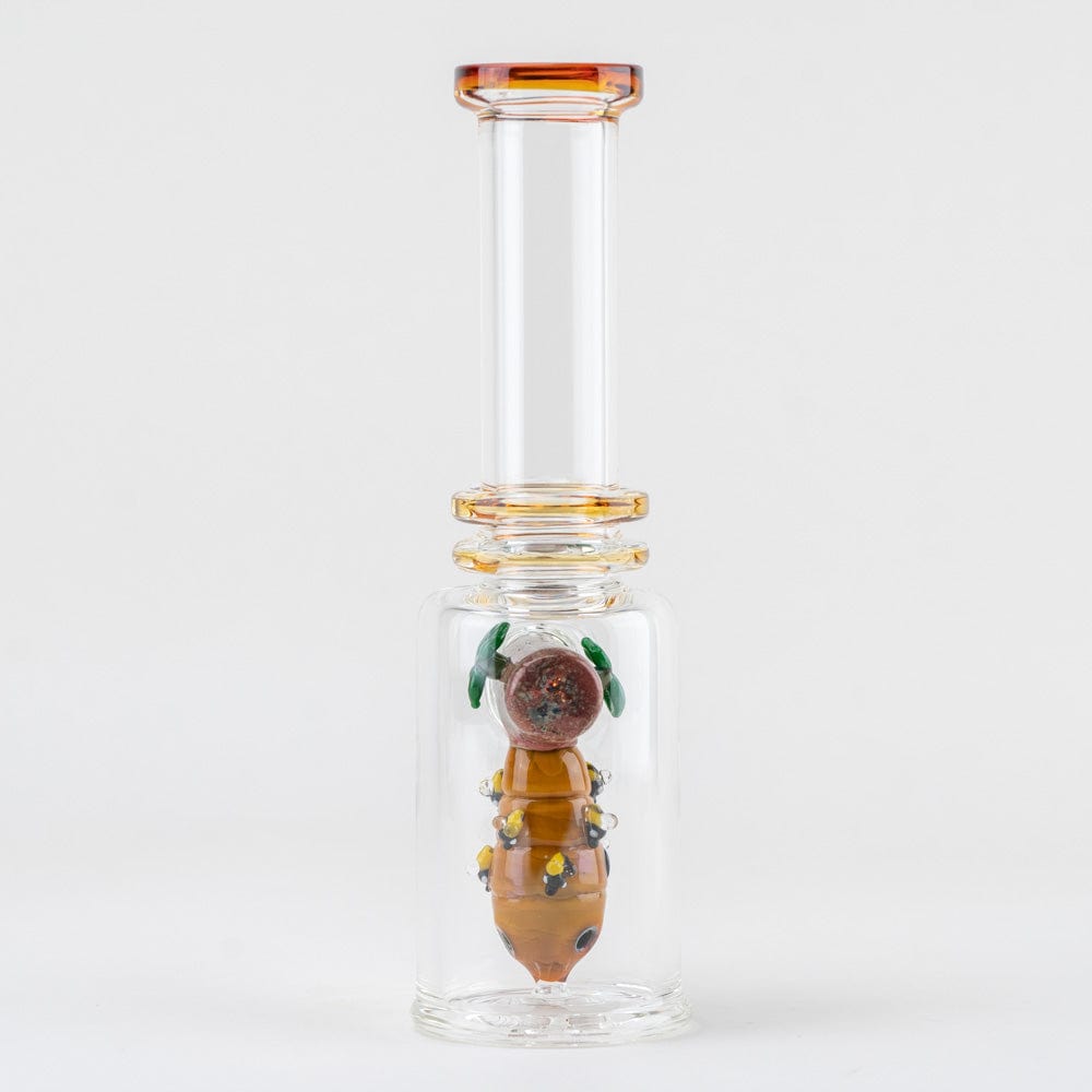 Front view of the “Save the Bees” Mini Tube, a clear glass tube with colorful details resembling a bee inside.
