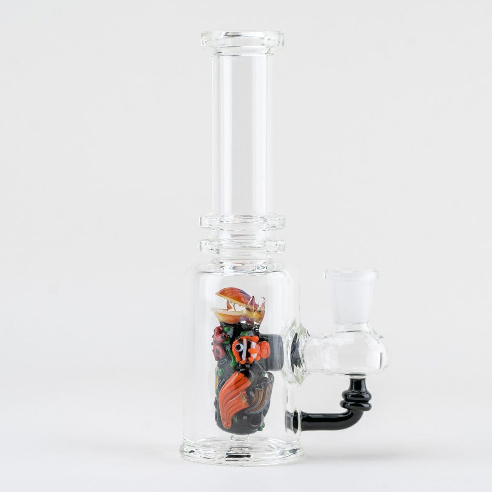 A front view of the “Save the Seas” Mini Tube, showing a clear glass tube with colorful marine life designs.